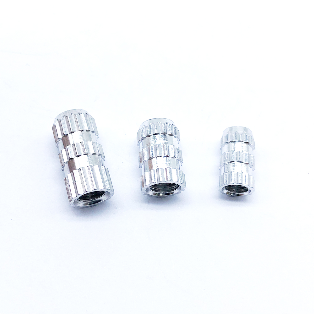 Embedded Nut with Embossed Inlay